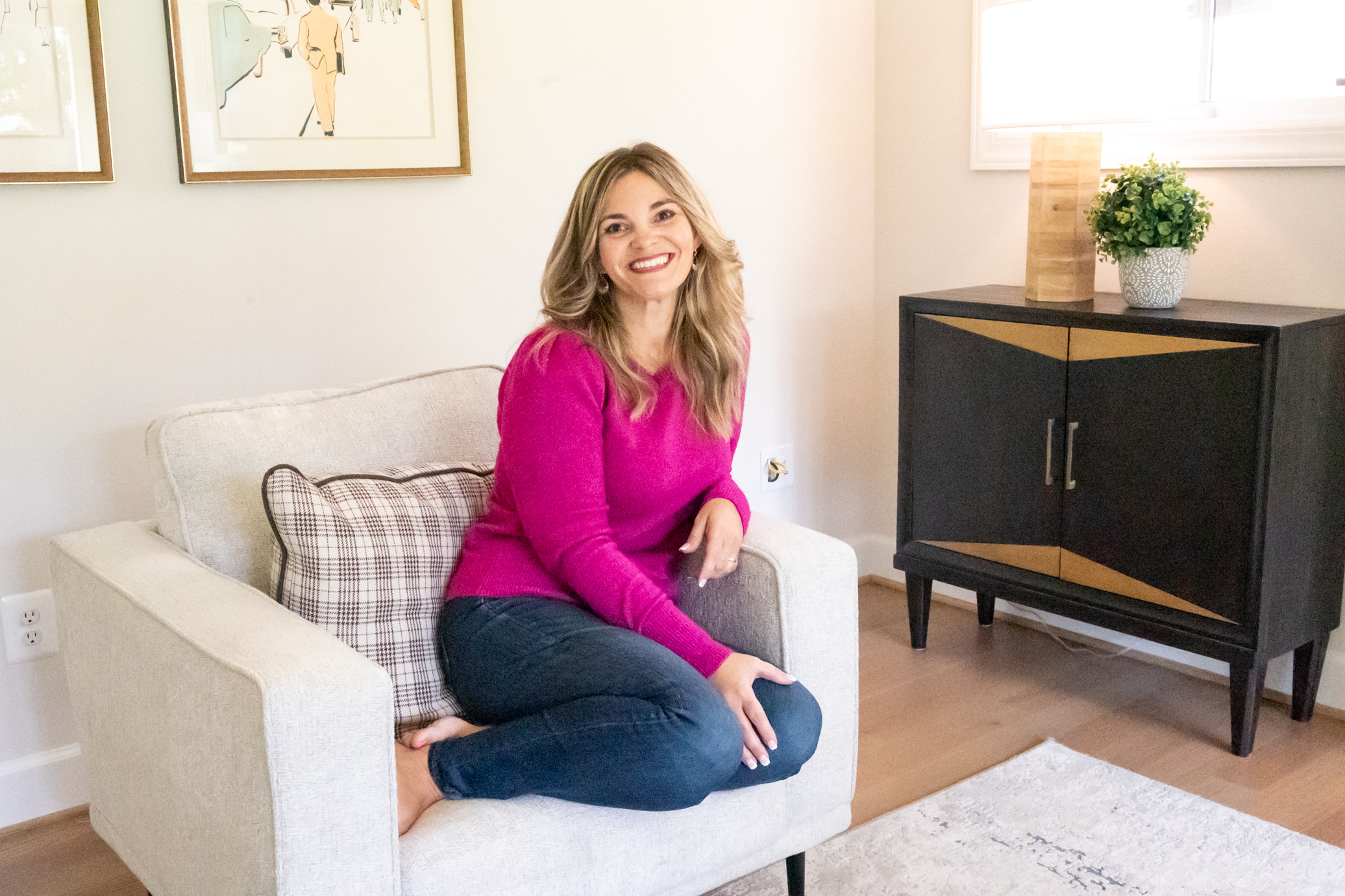 Kellie Ortiz seated in a bright home interior